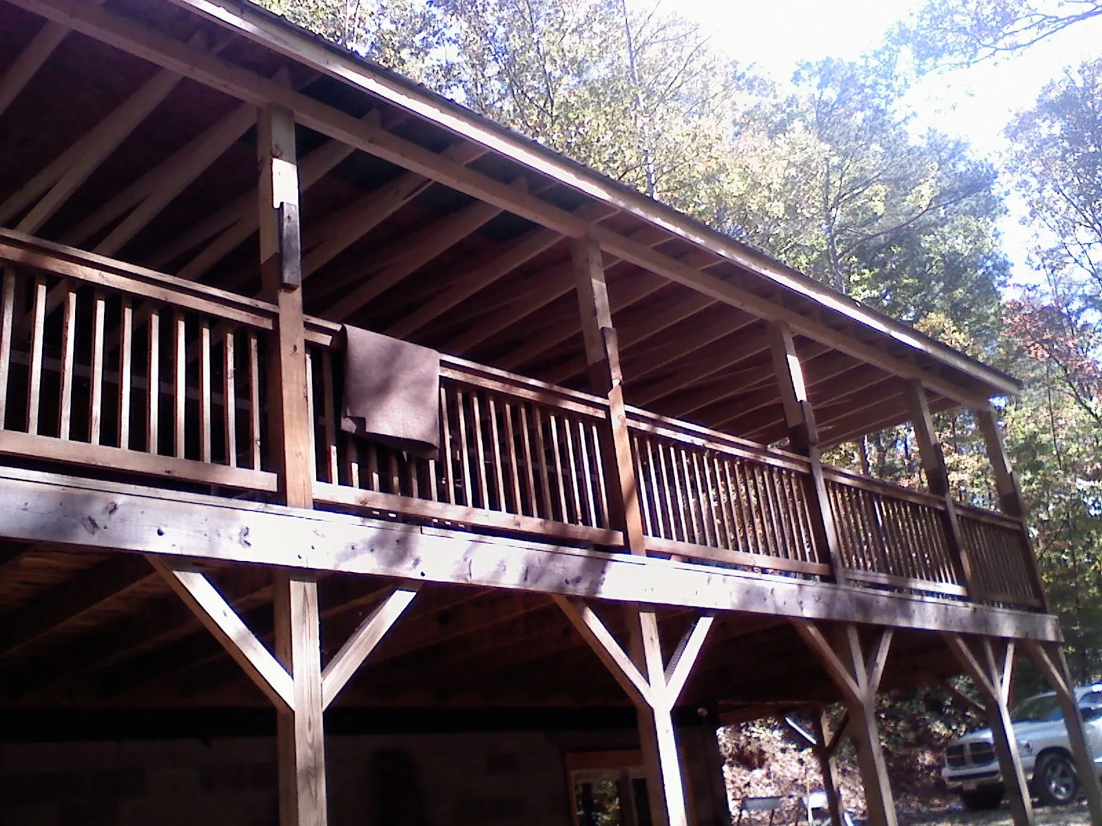 Timber framing under a new elevated porch and deck — Roof Leak Repair in Claremore by Roofing Brothers